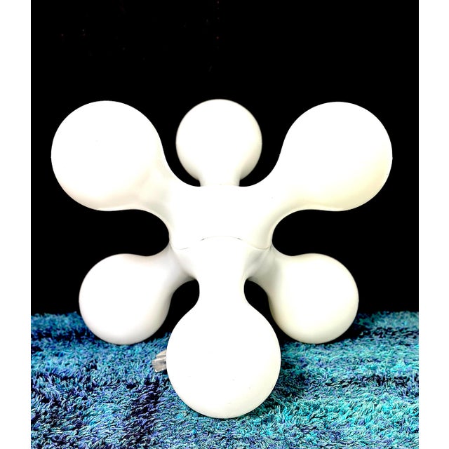 Kundalini atomium lamp, an icon of made in italy light and design. Designed by hopf & wortmann – büro für form and...