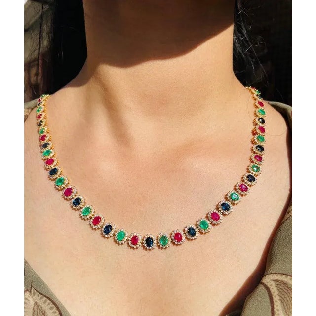 This is part of Chairish’s Fine Jewelry assortment. Multi Gemstone Necklace in 18K Gold studded with round cut emerald ,...