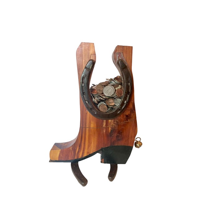 Bring a touch of Western charm to your home with this handcrafted vintage cowboy boot coin bank. Crafted from beautifully...