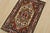 A traditional tribal Heriz rug hand-knotted with fine wool on a cotton foundation. This oriental rug features a central...