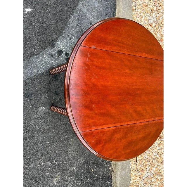 Antique Mahogany Twisted Drop Leaf Side Table. Solid wood table with bobbin turned supports. Approximate measures: Height...