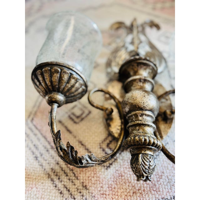 Vintage large wall candle sconce! Silver style with glass hurricanes. The previous owner glued the glass hurricanes to the...