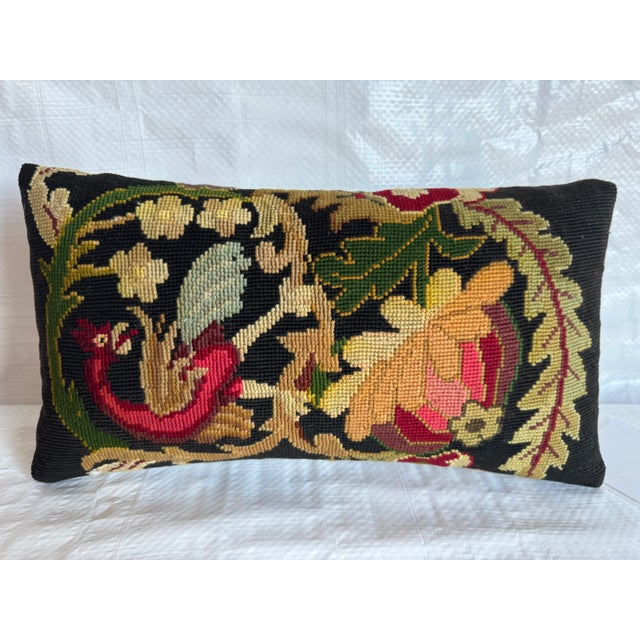 Grace your space with the English Needlework Pillow, a masterpiece measuring 15" x 8". Revel in timeless charm and...