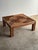This coffee table is a study in movement — an extraordinary concentric sunburst top of individually applied reedwork...