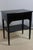 Side table Small reading table in ebonized wood in the Directoire style. This table has two side drawers and a leather-...
