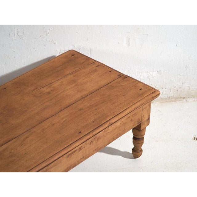 Antique low table in pine wood, traditional chinese furniture originating from northern china and dated circa 1930....