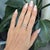 A timeless estate wedding band crafted in solid 14K gold with brilliant earth-mined diamonds for enduring elegance....