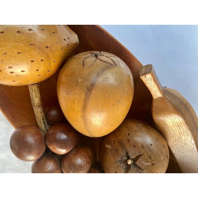 I remember growing up with a set of wood fruit on our dining table as a centerpiece. Very mid century, a la Brady Brunch,...