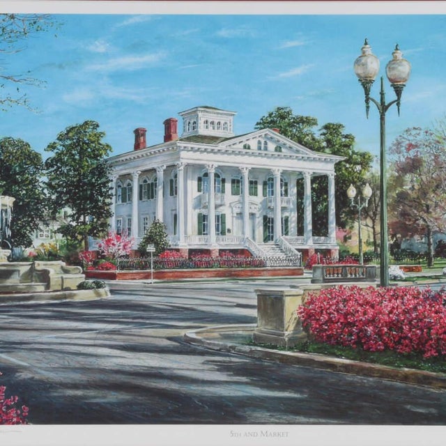 A Framed Print of William Mangum's "5th and Market" portrays a grand house, situated in a charming setting with flowers...