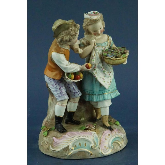 Item description: wonderful hard porcelain sculpture, polychrome, entirely decorated by hand, depicting a couple of...