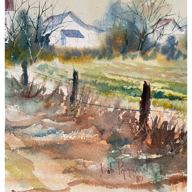 1987 watercolor on paper by Robert Elijah Pittman 1932–2016) of an Eastern North Carolina farm and dirt road. Signed and...
