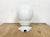 Vintage industrial ceiling light made in former Czechoslovakia during the 1950s. It features a white porcelain ceiling...