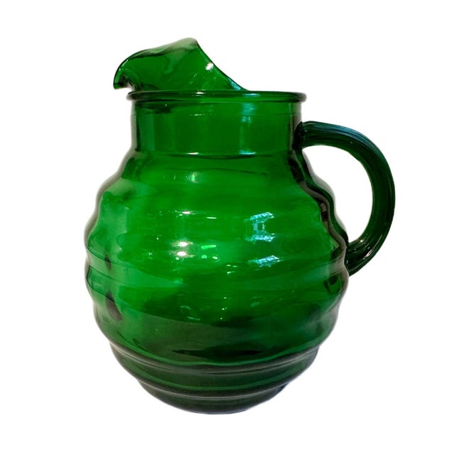 Vintage Mid Century Green Ribbed Glass Ball Pitcher w/Ice Lip 96 Oz A lovely vintage mid century glass pitcher in a dark...