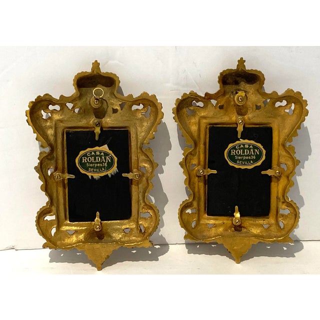 1960s Casa Rodan Sevilla Decoupage Spanish Nobility Portraits in Cast Brass Frames - a Set of 2 This stylish and chic pair...