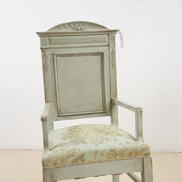 Pair of mint green chairs. Height: 110 Width: 50 Seat height: 51. This piece is attributed to the mentioned...