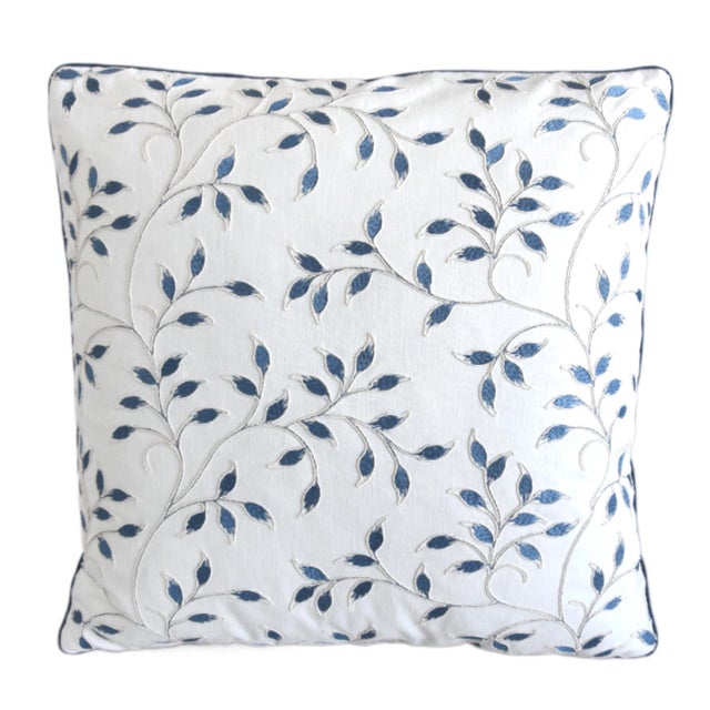 Custom-tailored pillow by Mike Seratt of The Prized Pig in Designer Page Turner embroidered blue sapphire leaf fabric...