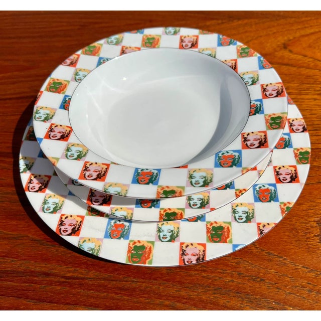 Enjoy this fun and colorful “Some Like it Hot”dinnerware set for 10 by pop icon Andy Warhol highlighting Marilyn Monroe....