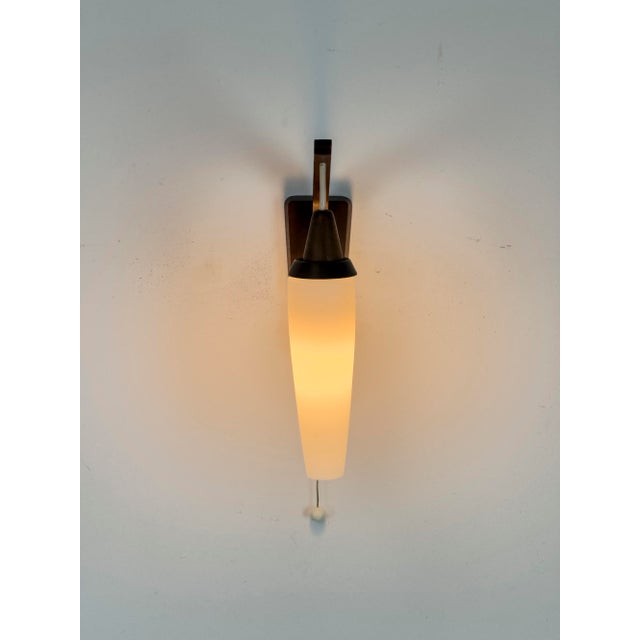 Beautiful, rare wall lamp with an arched arm and opal glass shade. Completely original. Very good condition, technically...