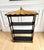 A timeless Chinoiserie pagoda-form wall étagère by Union National Furniture. Finished in matte black with hand-painted...