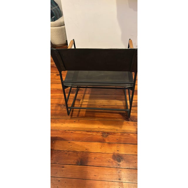 Gorgeous rocker from Four Hands. Discontinued model. Slim and sophisticated with a trend-forward touch. Black-finished...