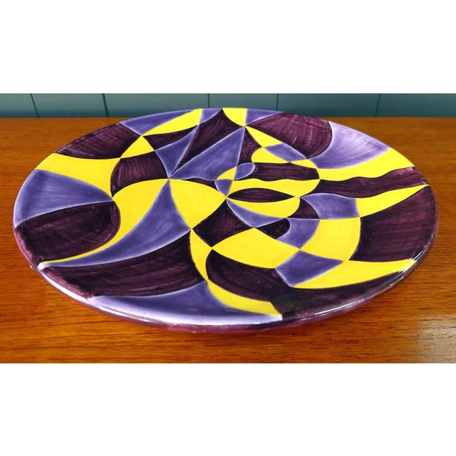 Futurist decorative plate made in 200 pieces by the Gatti ceramic workshop in Faenza in 1986. The futurist design is by...