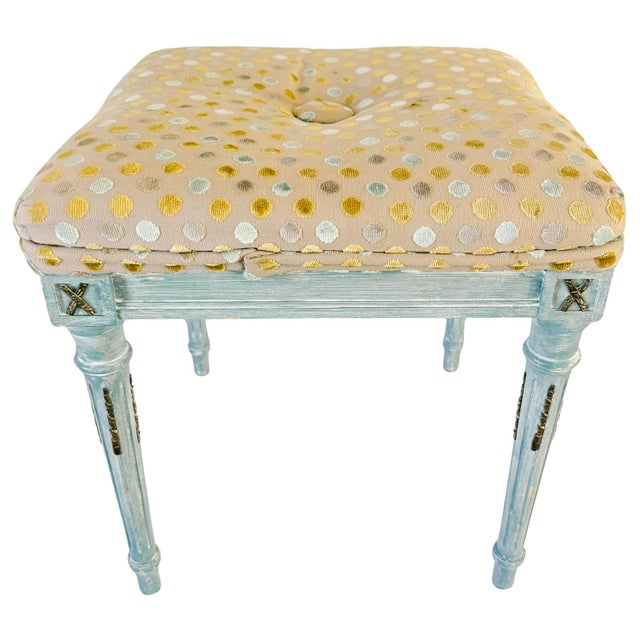 Pair of mid-20th century French Neoclassical / Louis XVI style stools features tapered, fluted legs and square frames...
