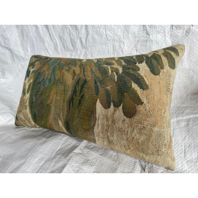 An elegant and highly decorative 17th century Brussels tapestry pillow, created from a Flemish textile fragment dating to...