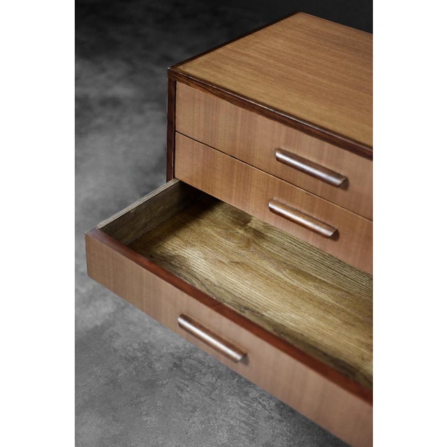 This classic sideboard was made in Denmark during the 1970s. It is made of an extremely interesting and rare wood, which...