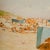 Untitled painting - Featuring a vast, pastel beach scene with lounging people. (Dutch, b. 1871- d.1941) - Oil on panel,...