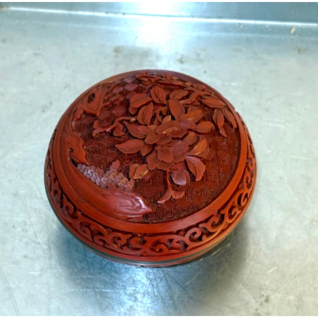 1940s-50s red carved cinnabar/cloisonne' round box. Excellent condition.