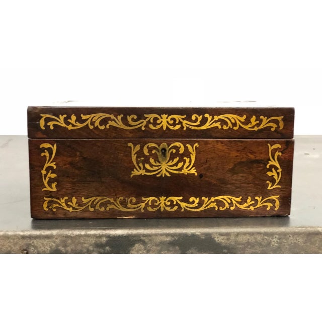 Gorgeous antique English sewing box in rosewood Brass inlay in a filigreed pattern on the front and top Original red...