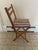 Adorable stripped polished canvas, folding picnic/ beach chair. It’s small and would fit a child perfectly. The canvas is...