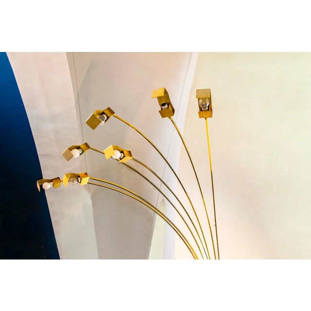 Brass floor lamp with seven lights, adjustable. Italian production. From the 1970s. European Plug (up to 250V).The wiring...