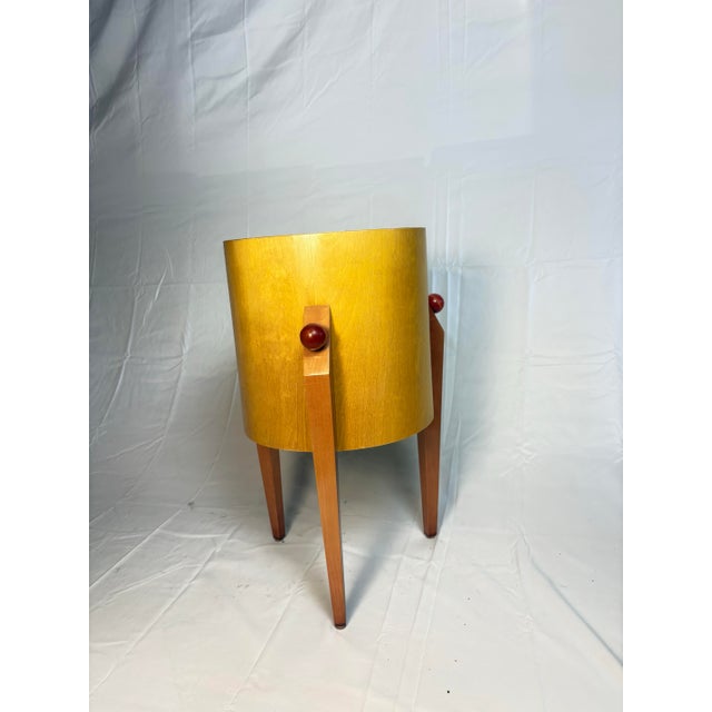 This fun and funky accent side table is a great way to being some post-modern Memphis style into your home. Its sculptural...