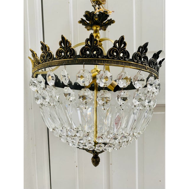 Beautiful 1960’s Hollywood Regency vintage crystal chandelier marked on the brass APC Inc. I have not plugged it into...