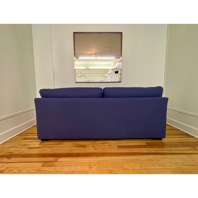 This custom-crafted modern three-cushion sofa seamlessly combines high-end artisan construction with supreme comfort....