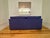 This custom-crafted modern three-cushion sofa seamlessly combines high-end artisan construction with supreme comfort....