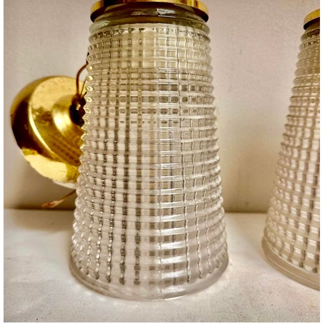 An unusual pair of tapered brass and glass pendants lights perfect for a kitchen island or foyer. Overall 11"H plus 3"...