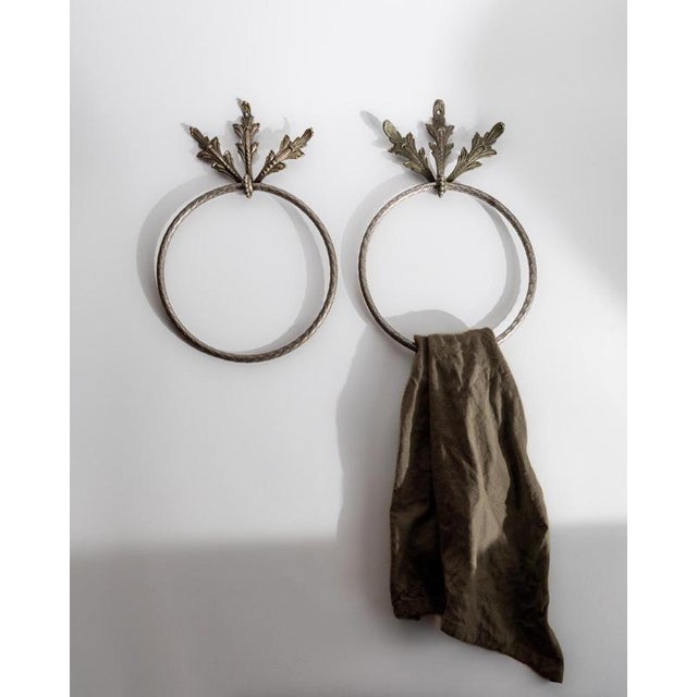 This vintage set of 2 hand towel rings from the 1930s features an elegant oak leaf relief design, combining practicality...