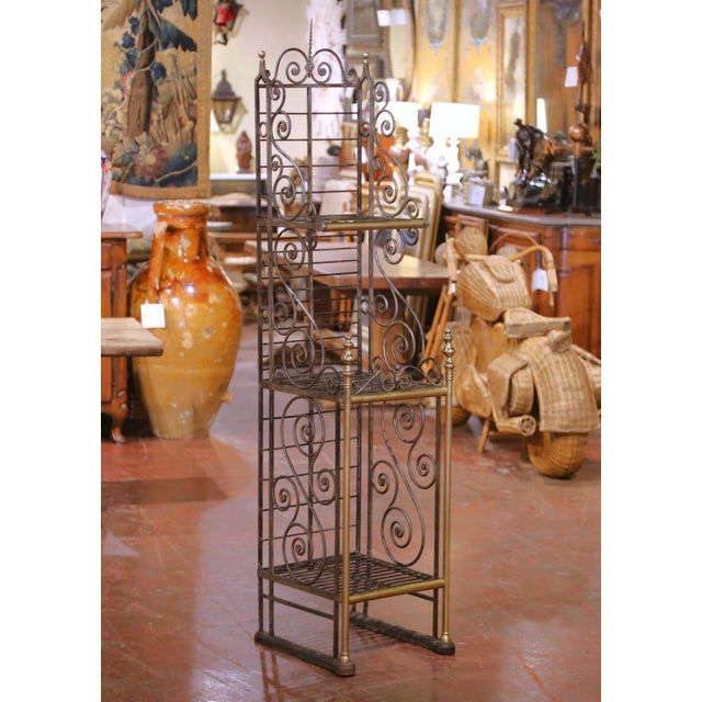 Decorate a kitchen, breakfast room, or covered patio with this elegant antique French baker’s rack crafted in Paris circa...