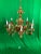 Hand carved eight light chandelier featuring a acanthus leaf design in a slightly distressed gold gilt finish. Italy