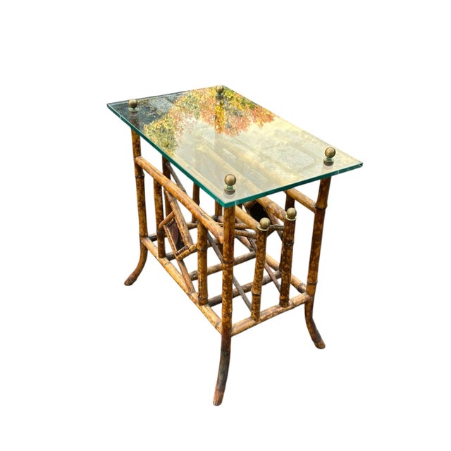 This vintage scorched bamboo side table combines natural texture with refined details, creating a warm and inviting...