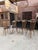 These bistro chairs are in good overall condition. Their faux leather seats are very comfortable. Note that there are a...