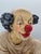 A unique, large sculpture depicting a seated circus clown, created by Filipino artist Jun Asilo in 1995. The sculpture...
