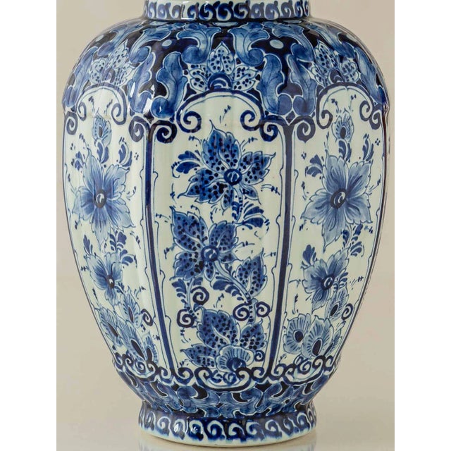 Dutch delft blue and white hand-painted ceramic table lamp with a new pleated uzbek ikat lampshade—brass fittings, fabric...