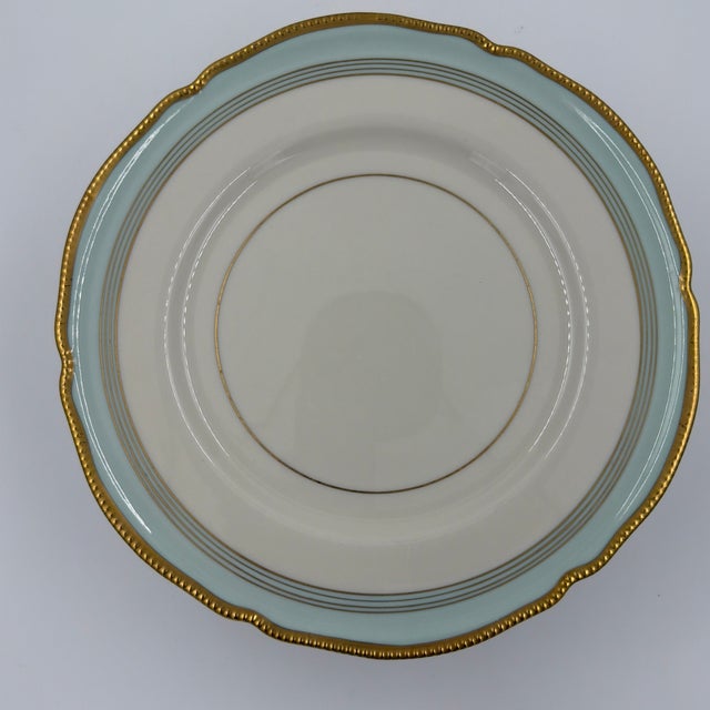 Elegant set of ten vintage Castleton China dinner plates in the Tremont pattern, featuring a soft aqua/turquoise border,...
