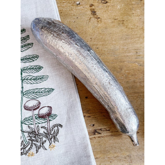 A wonderful vintage silvered cast bronze sculptural zucchini made by Maitland Smith! In fantastic condition, no breakage...