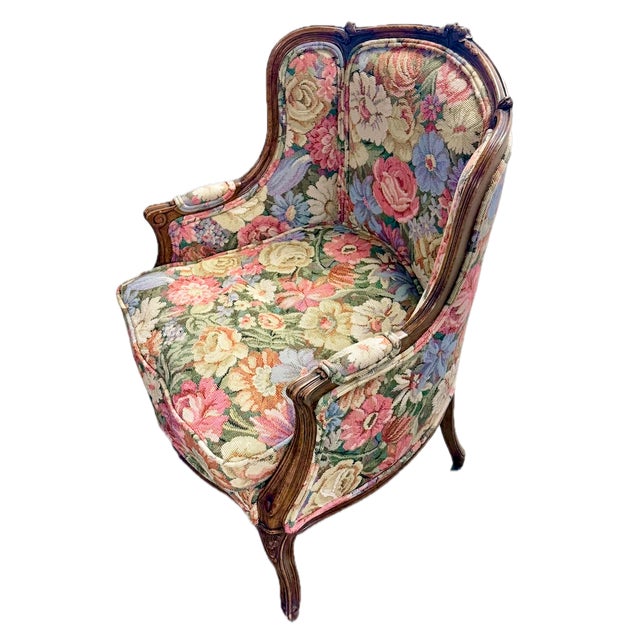 Antique hand-carved and floral needlepoint Bergere. with hand-carved floral frame. Bright vivid multicolored floral...
