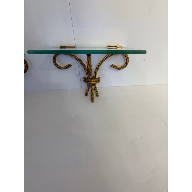 This pair of vintage Hollywood regency shelves is quite appealing to the eye. They are made small enough to fit most...
