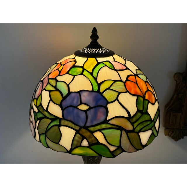 Vintage midcentury Tiffany style leaded stained glass table lamp. Shade is handmade with multicolor botanic floral...